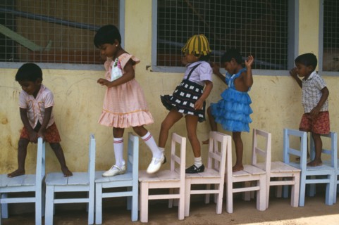 SRI LANKA, Colombo, Children learing to count through game playing.