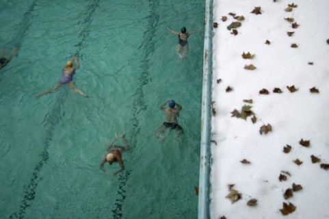 HUNGARY, Budapest, People swimming lengths in Luca thermal baths.