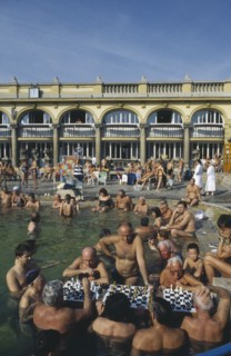 HUNGARY, Budapest, Szechenyi Furdo.  Chess players in thermal baths of spa.