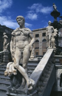 ITALY, Sicily, Palermo, Classical statuary and staircase.
