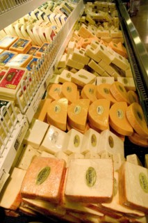 USA, Minnesota, St Paul, Display of cheese at the Mississippi Market a natural foods co-op located