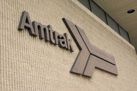 USA, Minnesota, St Paul, Amtrak passenger railroad sign and symbol on outside of Amtrak Train