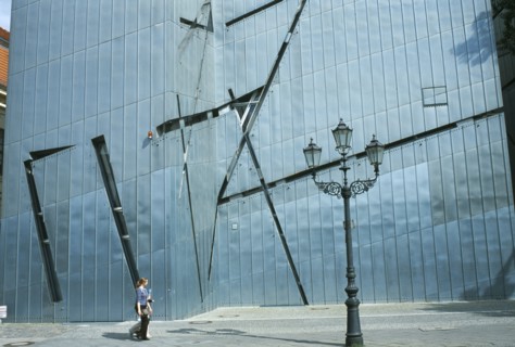 GERMANY, Berlin, Visitors walking past the zinc clad facade of the Jewish Museum designed by Polish