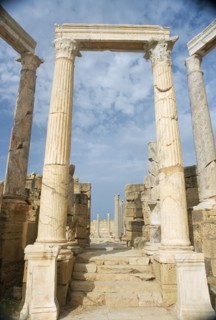LIBYA, Tripolitania, Leptis Magna, Ruins of Roman city founded in 6th Century BC.  Carved columns