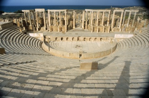 LIBYA, Tripolitania, Leptis Magna, Ruins of Roman city founded in 6th Century BC.  Carved columns