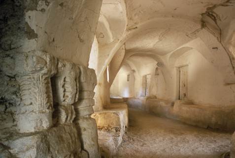 LIBYA, Ghadames, Passageway with carved pillars re-used as supports in the foreground.
