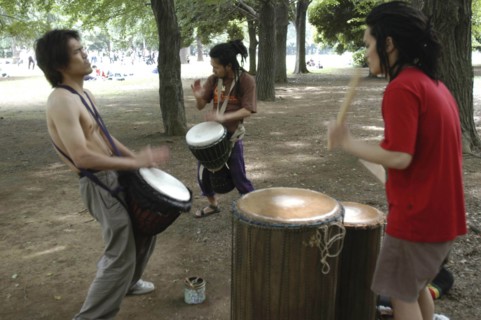 JAPAN, Honshu, Tokyo, "Harajuku. Yoyogi Park. Hiroaki Komura  and his brother Kenichi, with their