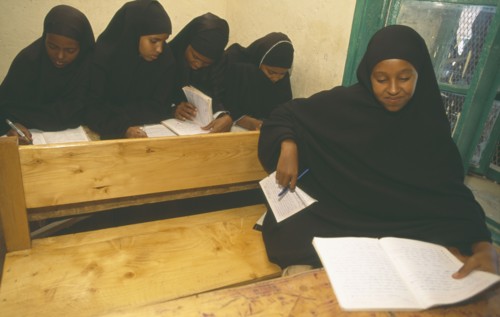 SOMALILAND, Hargeisa, Ali Osman Primary School.  Girls at desks in classroom.