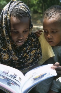 SOMALIA, Habare Village, Children using new Somali textbooks produced by Unicef.