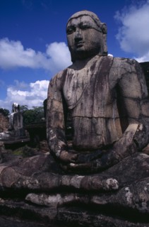 SRI LANKA, Polonnaruwa, The Vatadage. Seated Buddha statue within the quadrangle