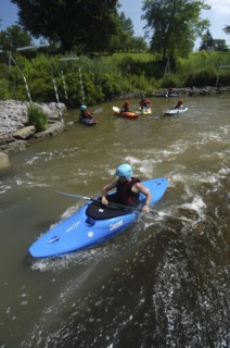 USA, New York, Rochester, "Japanese student, Alex Romanov, during a kayaking class of Genessee