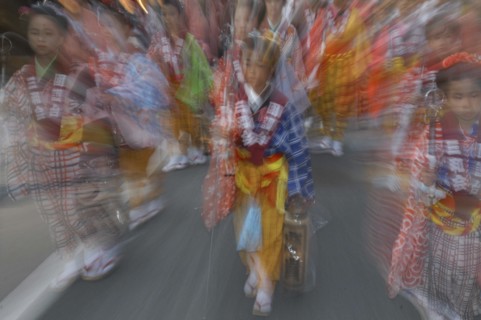 JAPAN, Chiba, Narita, "8 year old Maki Tsuchiya leads her neighborhood tekomae, girls that walk