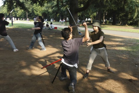 JAPAN, Honshu, Tokyo, "Harajuku. Yoyogi Park on Saturday afternoon, Miyuki Wada aged 31 and Takaki