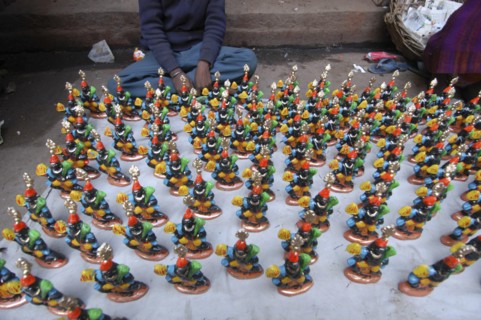 INDIA, Uttar Pradesh, Varanasi, Figurines of Kala Bhairava for sale outside Kala Bhairava Temple