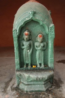 INDIA, Uttar Pradesh, Varanasi , Carved image of Shiva and Parbati at Ghai Ghat