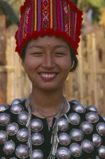 THAILAND, Chiang Mai Province, Muang Nga, Portrait of a Jinghpaw woman in traditional attire
