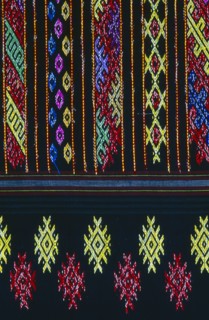 MYANMAR, Kachin State, Myitkyina, Close up detail of a Lacid womans sarong which is traditional