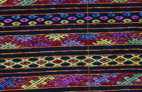 MYANMAR, Kachin State, Myitkyina, Close up detail of a Lacid womans sarong which is traditional