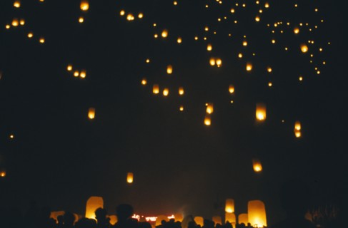 THAILAND, Chiang Mai, San Sai District, Loi Krathong Festival aka Yi Peng. People launching hot air
