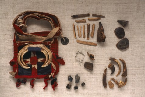 THAILAND, General, "Yao Shamans bag decorated with wild boar tusks and contents of wood, shells,