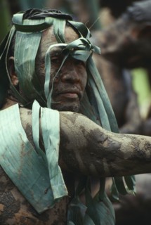 THAILAND, Loei Province, Dan Sai, Phi Ta Khon or Spirit Festival. Mud man covered in a layer of mud
