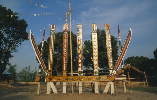 MYANMAR, Kachin State, Myitkyina, Jinghpaw Manao posts at Manao grounds