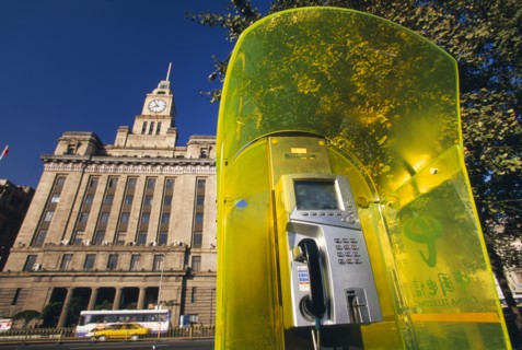 CHINA, Shanghai, Public telephone kiosk on the bund.