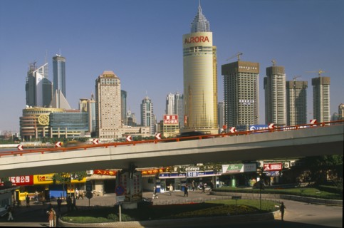 CHINA, Shanghai, "View of Pudong from the Bund.  Elevated roadway, shops and skyscrapers."
