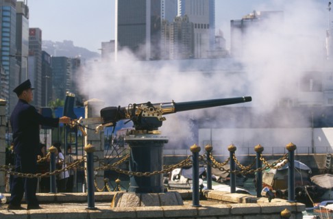 CHINA, Shanghai, Firing the Noon Day Gun on the Causeway Bay waterfront.