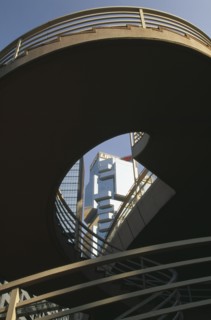 CHINA, Hong Kong, Steps to elevated walkway in the Central District framing view of the Lippo
