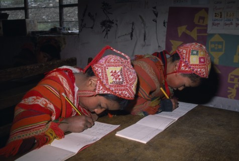 PERU, Andes, Cusco, "Tastayoc Village.  Quechua Indian children wearing traditional clothing, in