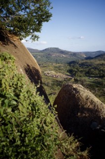 ZIMBABWE, Landscape, View over village huts and countryside.