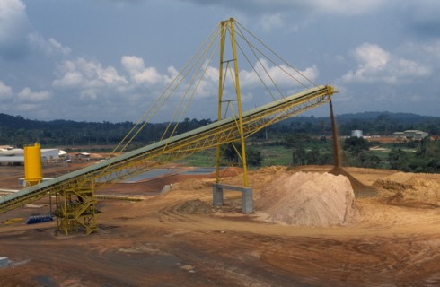 GHANA, Industry, Gold mine with conveyer belt extracting waste material.