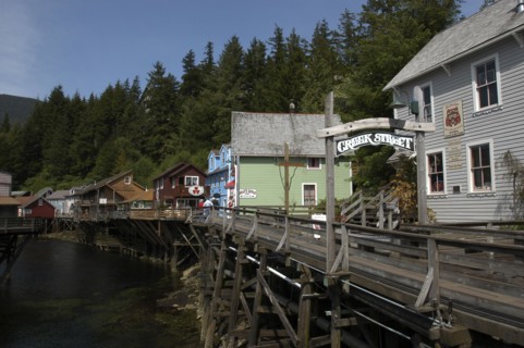 USA, Alaska, Ketchikan, View along Creek Street waterside houses and wooden walkway on propped up
