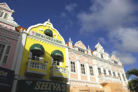 WEST INDIES, Dutch Antilles, Aruba, Oranjestad. Colourful colonial style facades of perfumerie and