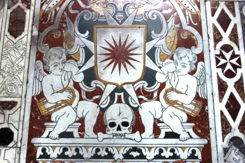 MALTA, Valletta , St Johns Cathedral. Detail of intricate marble inlaid tombstone forming part of a
