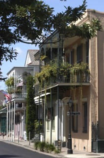 USA, Louisiana, New Orleans, French Quarter. Pastel coloured architecture with ironwork balconies