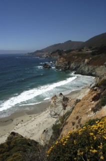 USA, California, Big Sur, Pacific Coast Highway. View over sandy bay and rocky coastline