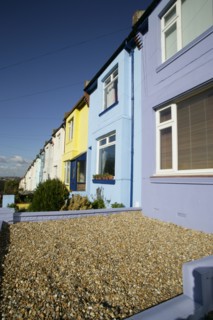 ENGLAND, East Sussex, Brighton, Brightly coloured terraced houses on Bear Road