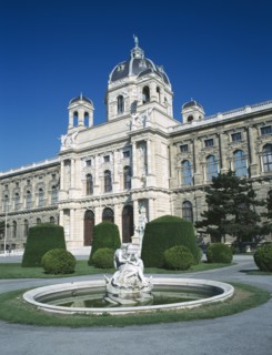 AUSTRIA, Vienna, The Natural History Museum with statue in pool in the foreground