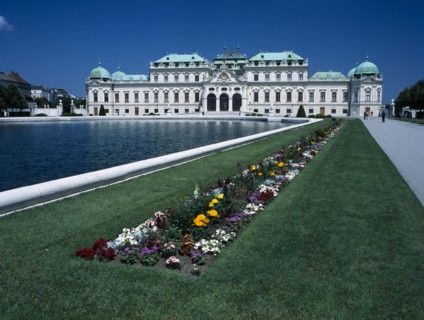 AUSTRIA, Vienna, Upper Belveder Palace southern facade seen over large pool in the gardens