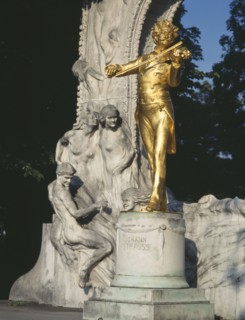 AUSTRIA, Vienna, City Park. Golden Johan Strauss statue