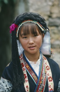 CHINA, Guizhou Province, Anshun District, Portrait of young woman of the Bouyei minority people.