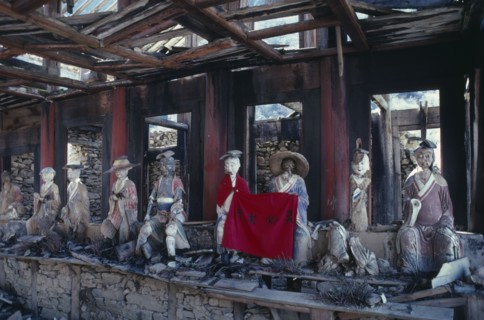 CHINA, Sichuan Province, Huanglong Valley, Yellow Dragon temple.  Dilapidated structure and damaged