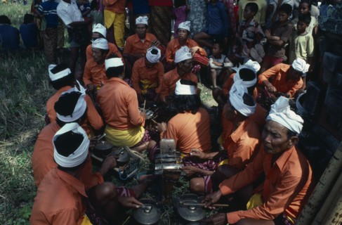 INDONESIA, Bali, Music, Gamelan orchestra playing at cremation ceremony.