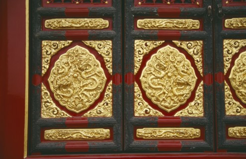 CHINA, Hebei, Beijing, "The Forbidden City.  Detail of red, black and gold decoration."