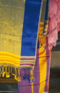 EGYPT, Markets, Coloured woven shawls on sale in the souq.