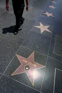USA, California, Los Angeles, Hollywood. Pink marble and bronze stars embedded into Hollywood