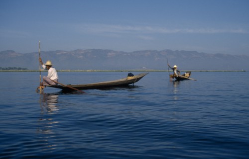 MYANMAR, Inle Lake, Fishermen with narrow wooden canoes.
