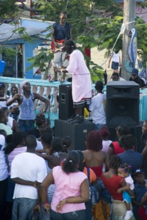 WEST INDIES, St Vincent & The Grenadines, Union Island, Singer and guitarist with sound system at